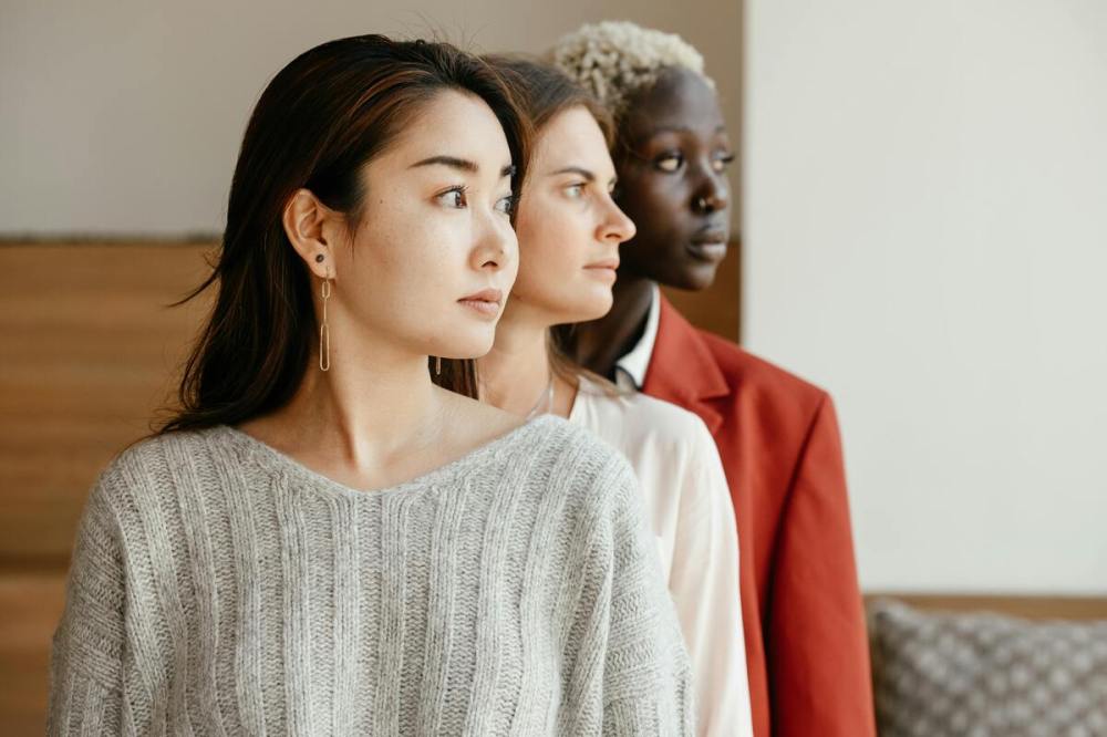 Three women with different attire